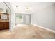 Spacious bedroom with tile flooring and access to a bathroom at 1473 Farrindon Cir, Lake Mary, FL 32746