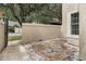 Stone patio and walkway leading to the home's entrance at 1473 Farrindon Cir, Lake Mary, FL 32746