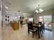 Open dining area with a six-person table at 8943 Bismarck Palm Rd, Kissimmee, FL 34747