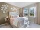 Spacious bedroom with large windows and a neutral color palette at 2422 Greenwood Oak Dr, Ocoee, FL 34761