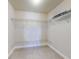 Large walk-in closet with wire shelving at 5 Riverwalk Dr # 407, New Smyrna Beach, FL 32169