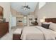 Spacious bedroom with a king-size bed and built-in dresser at 6659 Crenshaw Dr, Orlando, FL 32835