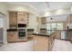 Spacious kitchen with an island, ample cabinetry, and modern appliances at 6659 Crenshaw Dr, Orlando, FL 32835