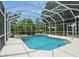 Relaxing screened-in pool area at 6659 Crenshaw Dr, Orlando, FL 32835