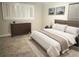 Relaxing Primary bedroom featuring a king-size bed and built-in dresser at 6659 Crenshaw Dr, Orlando, FL 32835