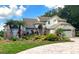 Two-story house with landscaped front yard at 6659 Crenshaw Dr, Orlando, FL 32835