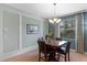 Elegant dining room with a charming wooden table and chairs at 3606 Solana Cir, Clermont, FL 34711