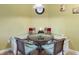 Cozy breakfast nook with a round table and wicker chairs at 3606 Solana Cir, Clermont, FL 34711