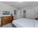 Comfortable bedroom with a full-size bed and built-in closet at 1427 Rolling Fairway Dr, Davenport, FL 33896