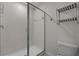 Modern bathroom with shower stall and tiled walls at 1427 Rolling Fairway Dr, Davenport, FL 33896