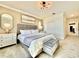 Bright bedroom with king-size bed and access to a shared bathroom at 9095 Sommerset Hills Dr, Davenport, FL 33896