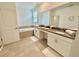 Double vanity bathroom with soaking tub and separate shower at 9095 Sommerset Hills Dr, Davenport, FL 33896