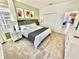 Main bedroom with king-size bed and access to the backyard at 9095 Sommerset Hills Dr, Davenport, FL 33896