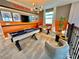 Game room with pool table, foosball table, and plenty of space at 9095 Sommerset Hills Dr, Davenport, FL 33896