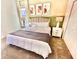 Bright bedroom with king-size bed and stylish wall art at 9095 Sommerset Hills Dr, Davenport, FL 33896