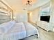 King-size bed and a dresser in a large bedroom with great views at 9095 Sommerset Hills Dr, Davenport, FL 33896