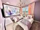 Spacious bedroom with two twin beds, Frozen mural, and plenty of light at 9095 Sommerset Hills Dr, Davenport, FL 33896