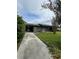 Single-story home with a stone facade and driveway at 4827 Lanette St, Orlando, FL 32811