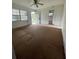 Spacious living room with carpeted floors at 4827 Lanette St, Orlando, FL 32811