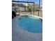 Inviting screened pool with basketball hoop at 1138 Knollwood Dr, Davenport, FL 33837