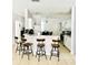 Kitchen with breakfast bar and white cabinets at 1138 Knollwood Dr, Davenport, FL 33837