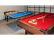 Fun game room with pool table, foosball, and ping pong at 1138 Knollwood Dr, Davenport, FL 33837