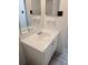 Bright bathroom featuring a vanity with a single sink at 1250 S Denning Dr # 122, Winter Park, FL 32789