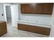 Built-in wood cabinets and drawers provide ample storage at 1250 S Denning Dr # 122, Winter Park, FL 32789