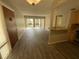 Bright and spacious entryway with wood-look floors at 588 Orange Dr # 131, Altamonte Springs, FL 32701