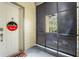 Front entry of a townhome with a white door and screen at 610 Celebration Ave # 1209, Celebration, FL 34747