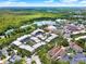 Aerial view of community with lake and town center at 610 Celebration Ave # 1209, Celebration, FL 34747