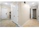 Interior entryway with tile flooring and coat closet at 610 Celebration Ave # 1209, Celebration, FL 34747