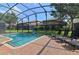 Enjoy this refreshing pool with lounge chairs for ultimate relaxation at 1435 Moon Valley Dr, Davenport, FL 33896