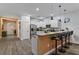 Kitchen island with seating for three, creating a breakfast bar at 1435 Moon Valley Dr, Davenport, FL 33896