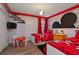 Mickey Mouse-themed bedroom with twin beds and playful decor at 1435 Moon Valley Dr, Davenport, FL 33896
