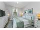 Bright bedroom with queen-size bed and plenty of storage at 1435 Moon Valley Dr, Davenport, FL 33896