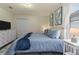 Bedroom with king-size bed and calming blue bedding at 1435 Moon Valley Dr, Davenport, FL 33896