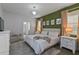 Relaxing Primary bedroom with king-size bed and ensuite bathroom at 1435 Moon Valley Dr, Davenport, FL 33896