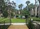 Community pool and lush landscaping with a bridge at 588 Orange Dr # 131, Altamonte Springs, FL 32701