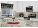 Bright kitchen with white cabinets, granite countertops, and stainless steel appliances at 900 Sussex Close, Orlando, FL 32804