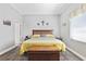 Bright bedroom with a king-size bed and ample space at 900 Sussex Close, Orlando, FL 32804