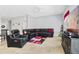 Open living room with comfortable leather seating at 900 Sussex Close, Orlando, FL 32804