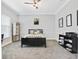 Spacious bedroom with a queen-size bed, built-in shelving, and workspace at 900 Sussex Close, Orlando, FL 32804