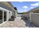 Private patio with brick pavers and seating area at 900 Sussex Close, Orlando, FL 32804