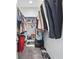 Walk-in closet with ample shelving and hanging space at 900 Sussex Close, Orlando, FL 32804
