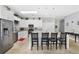Modern kitchen with stainless steel appliances and large island at 900 Sussex Close, Orlando, FL 32804