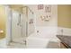 Bathroom with shower and bathtub at 106 Haversham Way, Davenport, FL 33897