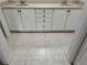 Bathroom with double sink vanity and beige tile flooring at 2331 Salzburg Loop, Winter Haven, FL 33884