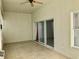 Spacious screened porch with tile flooring and sliding glass doors at 2331 Salzburg Loop, Winter Haven, FL 33884