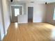 Spacious living room with hardwood floors and ample natural light at 963 N Jacks Lake Rd, Clermont, FL 34711
